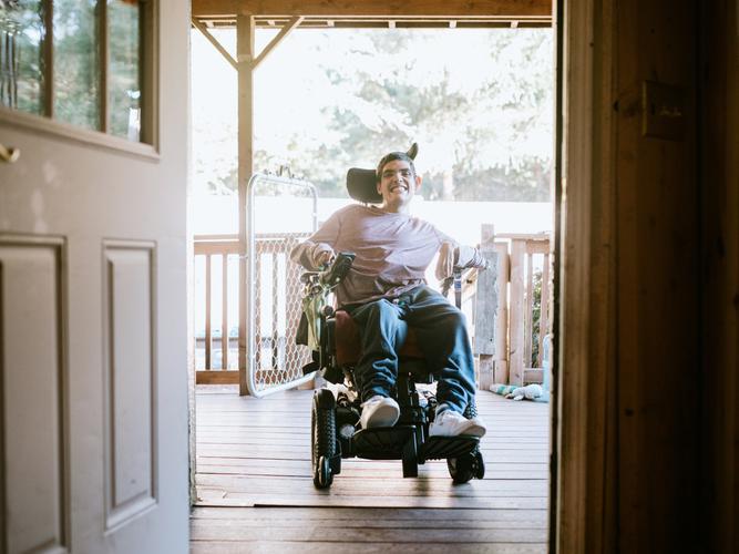 https://www.agedcareguide.com.au/assets/news/articles/large_confident-young-man-in-wheelchair-at-home-picture-id1067566788.jpg