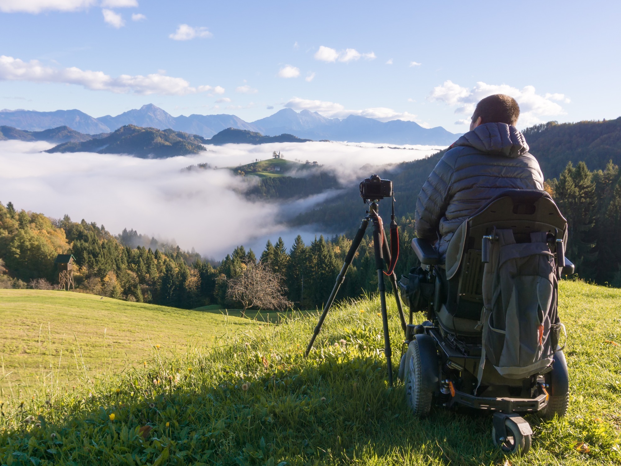 https://www.agedcareguide.com.au/assets/news/articles/man-on-wheelchair-taking-photos-of-beautiful-landscape-in-a-foggy-st-picture-id1124687034.jpg
