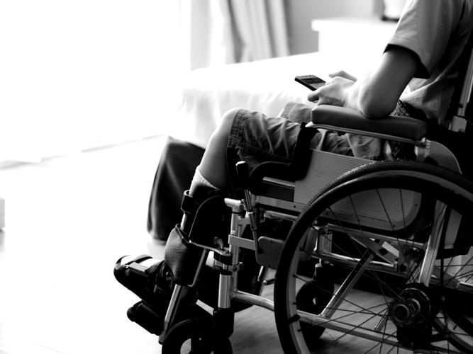 In some cases unavailable support has left people who use wheelchairs sleeping in them overnight because there is no help to get them into their bed. [Source: Shutterstock]