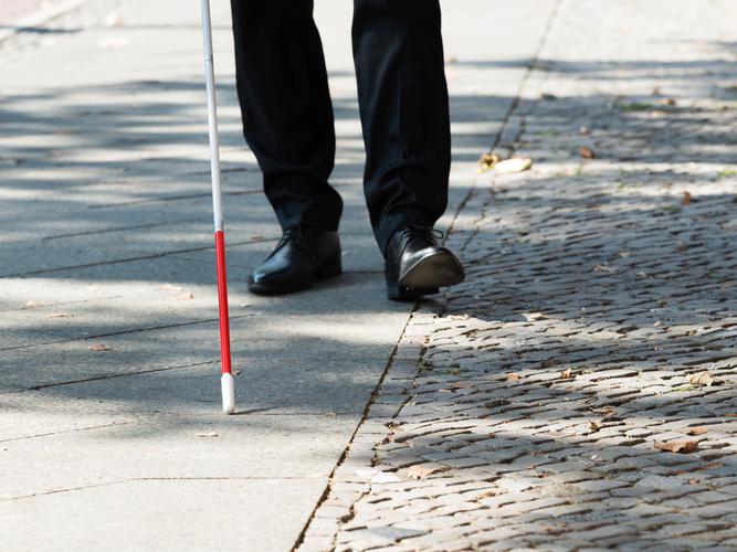  The survey revealed 64 percent of people who use white canes have been grabbed or handled by a member of the public without asking for help [Source: Shutterstock]