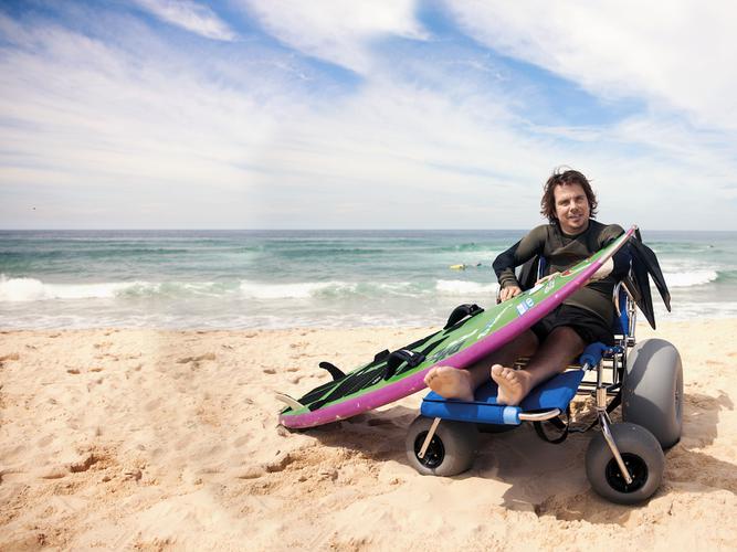 Disabled surfer and Feros Care ambassador Barney Miller [Source: Supplied]