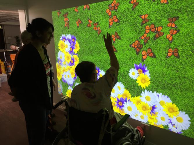 The new sensory wall display units boast vivid imagery, sound and light projections and detect touch gestures, similar to those used on smartphones and tablets [Source: Achieve Australia]