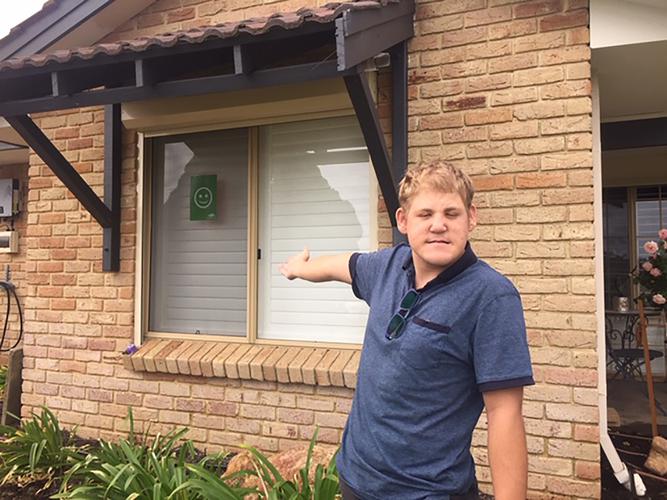 Dearne Arrah and her son Jack, who lives with a disability, are one of many families using the ‘I’m OK card’ in their home. (Source: Supplied) 