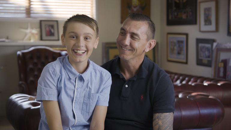 Mat Rogers (pictured) shares the juggling act of himself and his wife as he fathers four children, including his youngest son Max (pictured), who has autism [Source: Autism Awareness Australia]