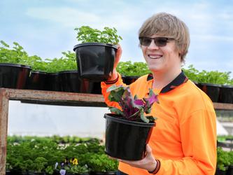 Outdoorsy by nature, Barkuma’s DES helped Sam after high school to gain work experience and employment at Living Colour Nursery, where he has been happily employed for 2 years. [Source: Supplied]
