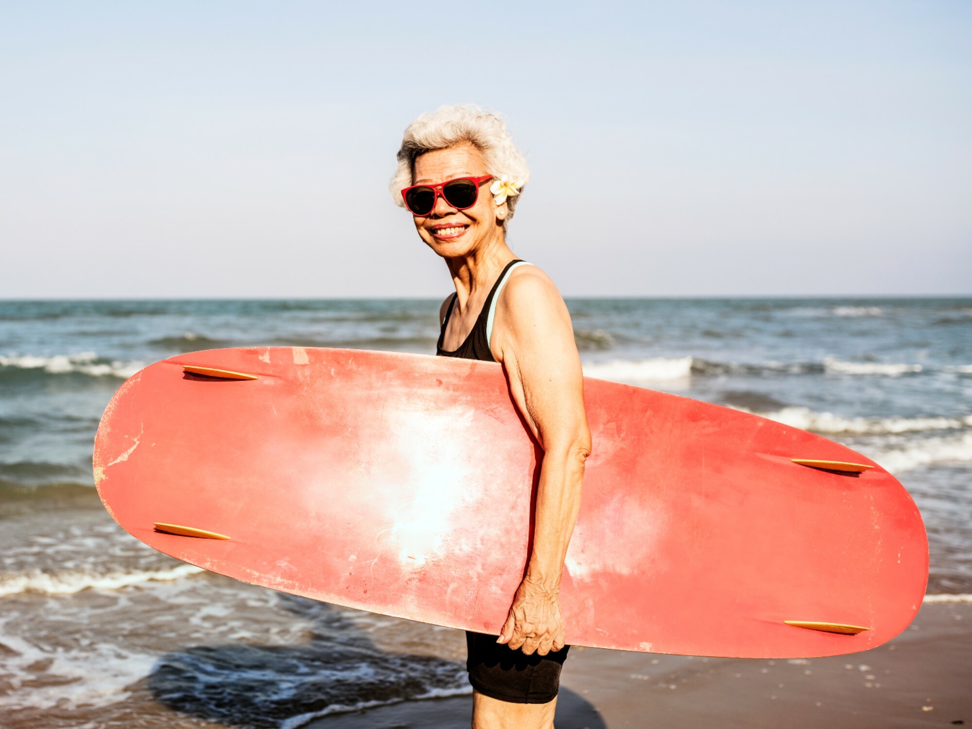 Older woman going for a surf