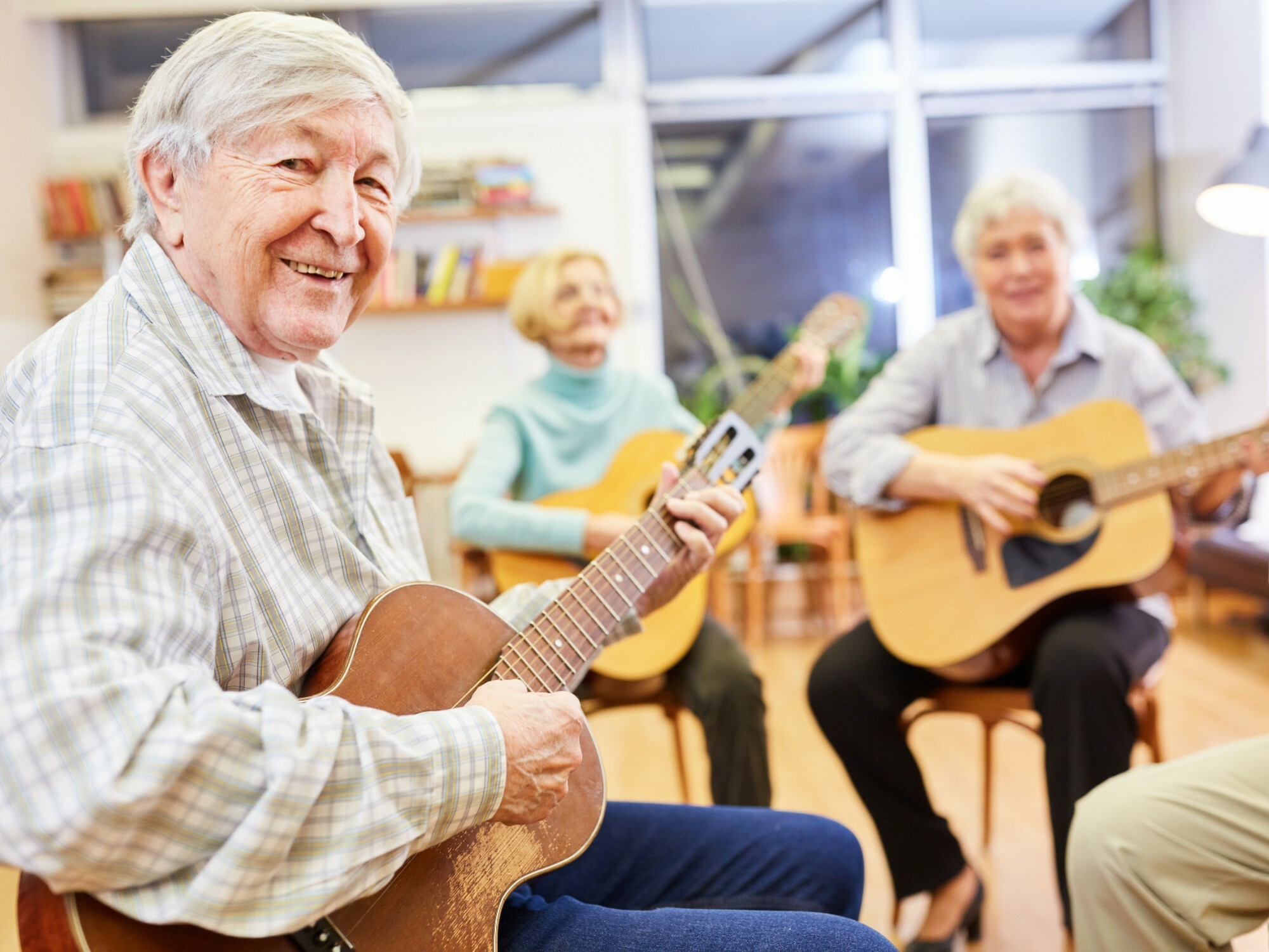 Group of older people in a music therapy session